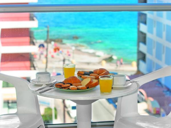 Athena Hotel : photo 4 de la chambre chambre double ou lits jumeaux - vue latérale sur mer