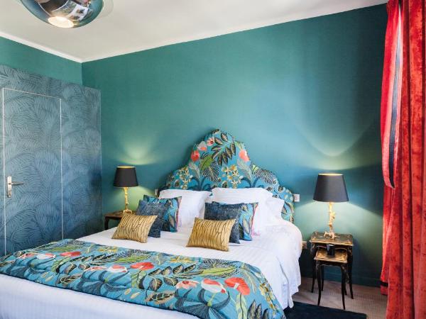 Maison Du Collectionneur : photo 2 de la chambre chambre double deluxe avec baignoire