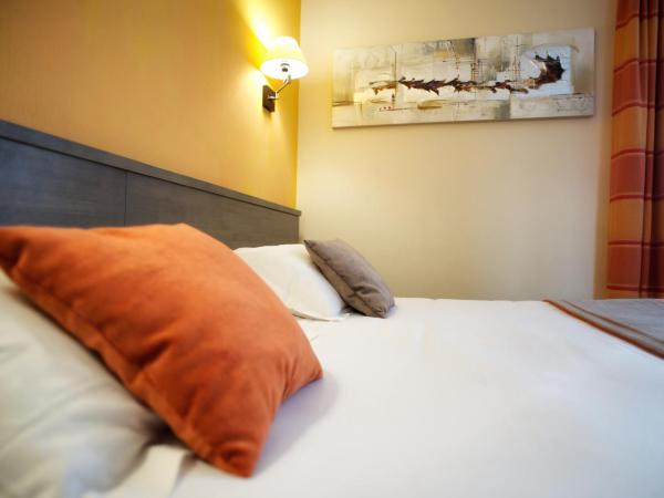 Brit Hotel Le Surcouf : photo 10 de la chambre chambre double supérieure avec lit king-size
