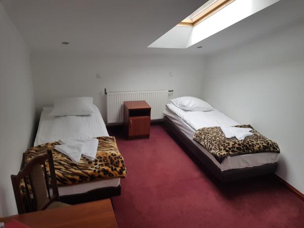 Zajazd Pod Gwiazdami : photo 10 de la chambre chambre lits jumeaux
