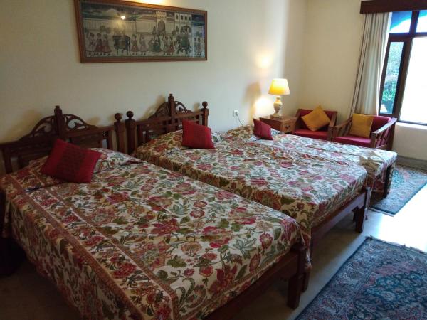 Hotel Meghniwas : photo 4 de la chambre chambre triple deluxe