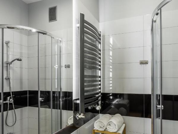 Apartamenty Centrum Częstochowa Stara Kamienica : photo 4 de la chambre appartement avec douche