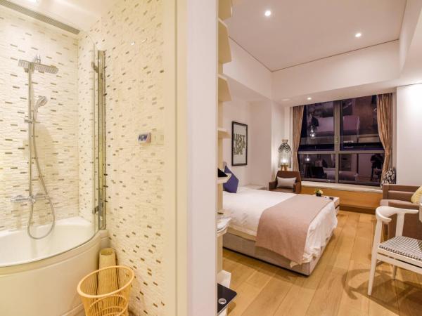 The Clouds Apartment : photo 1 de la chambre chambre double deluxe avec douche