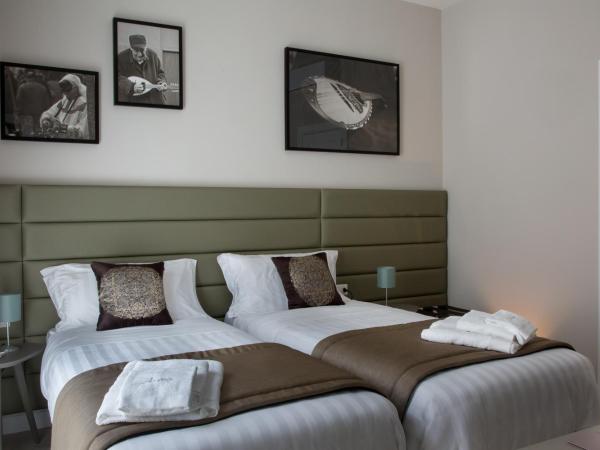 Naplesuite : photo 1 de la chambre chambre lits jumeaux