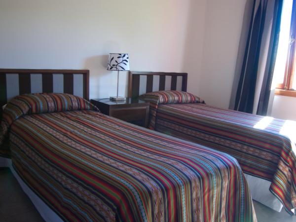 Cabañas Normana Inn : photo 3 de la chambre bungalow - vue sur jardin