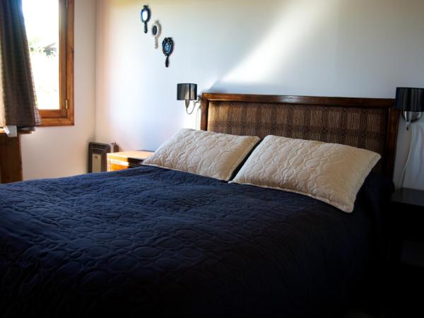 Cabañas Normana Inn : photo 4 de la chambre bungalow - vue sur jardin