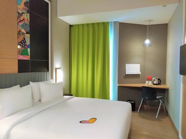 MaxOne Platinum Hayam Wuruk : photo 3 de la chambre happiness room double