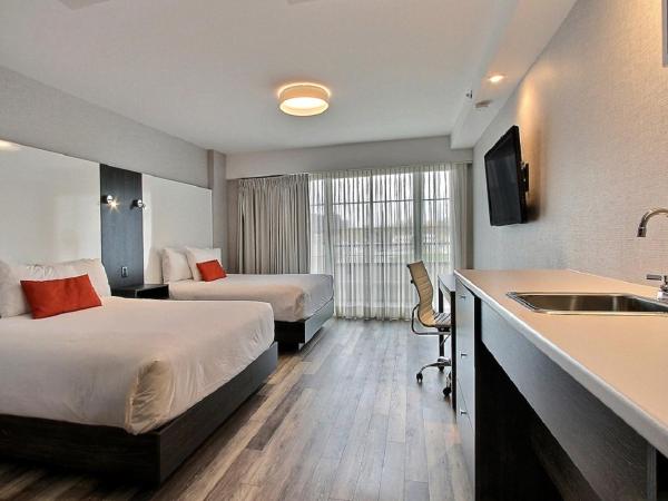 Hotel Classique : photo 1 de la chambre chambre standard avec 2 lits queen-size et balcon