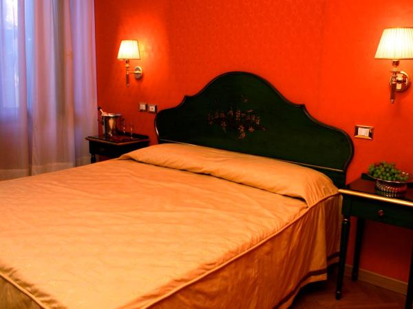 Palazzo Cendon Piano Antico : photo 4 de la chambre chambre triple supérieure