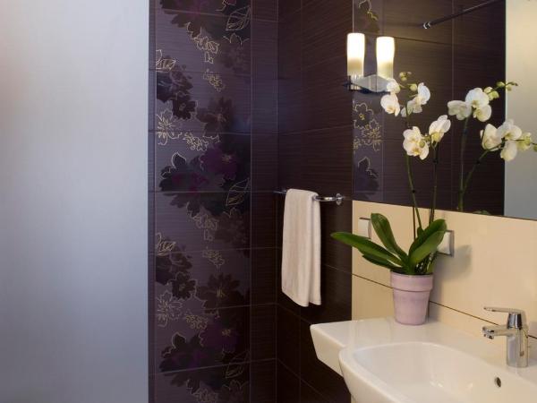 Hotel Metropol : photo 7 de la chambre chambre familiale (2 adultes et 2 enfants)