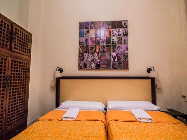 Nuevo Suizo : photo 3 de la chambre chambre double ou lits jumeaux avec salle de bains commune