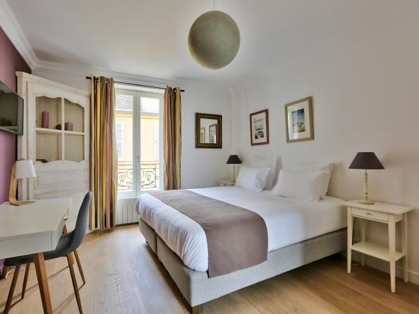 Le clos de l'olivier : photo 2 de la chambre chambre double ou lits jumeaux