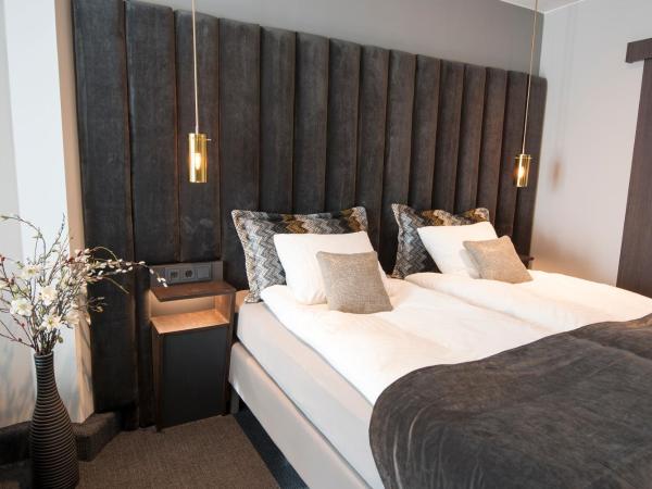 B14 Apartments & Rooms : photo 6 de la chambre chambre quadruple supérieure avec salle de bains privative