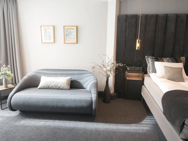 B14 Apartments & Rooms : photo 3 de la chambre chambre quadruple supérieure avec salle de bains privative