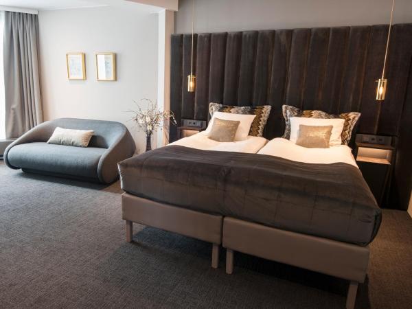 B14 Apartments & Rooms : photo 1 de la chambre chambre quadruple supérieure avec salle de bains privative