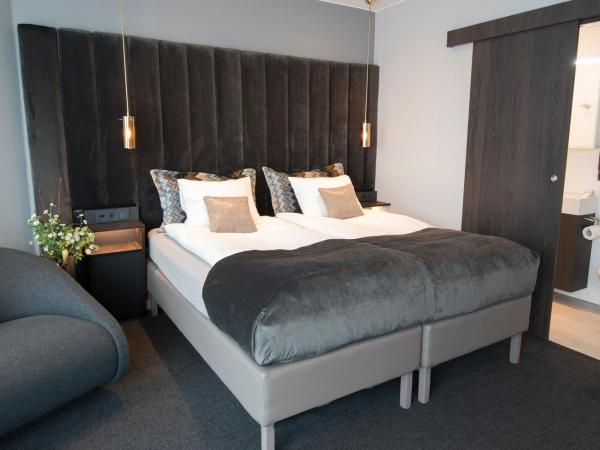 B14 Apartments & Rooms : photo 8 de la chambre chambre quadruple supérieure avec salle de bains privative