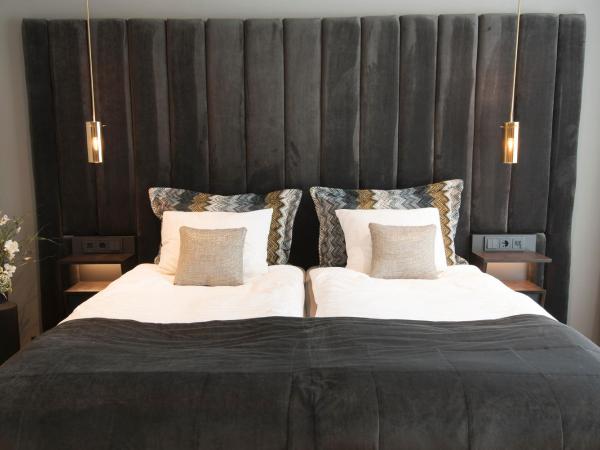 B14 Apartments & Rooms : photo 2 de la chambre chambre triple avec salle de bains privative