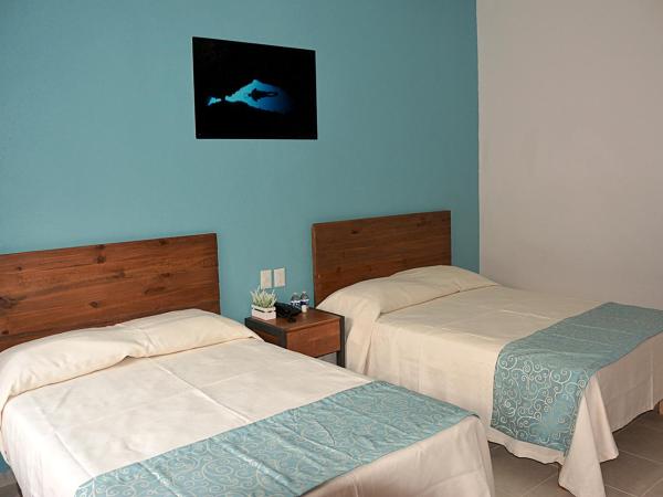 Acapulco Amor : photo 3 de la chambre chambre quadruple standard
