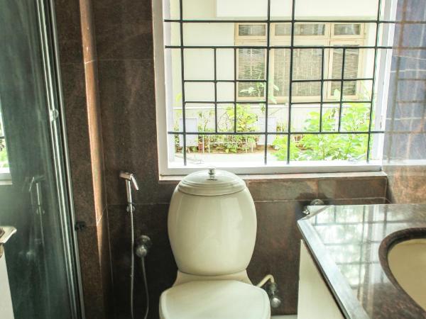 Locul Uptown - Near Bangalore Palace Grounds : photo 5 de la chambre chambre simple deluxe