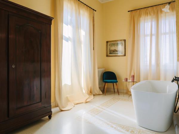 Dimora Archimedea : photo 7 de la chambre suite supérieure lit king-size