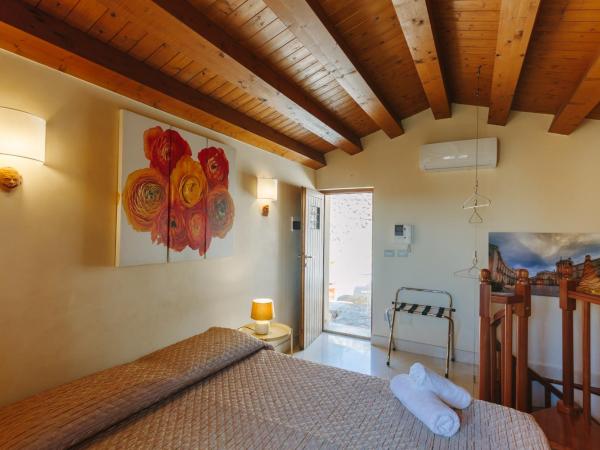 Dimora Archimedea : photo 3 de la chambre chambre lit queen-size