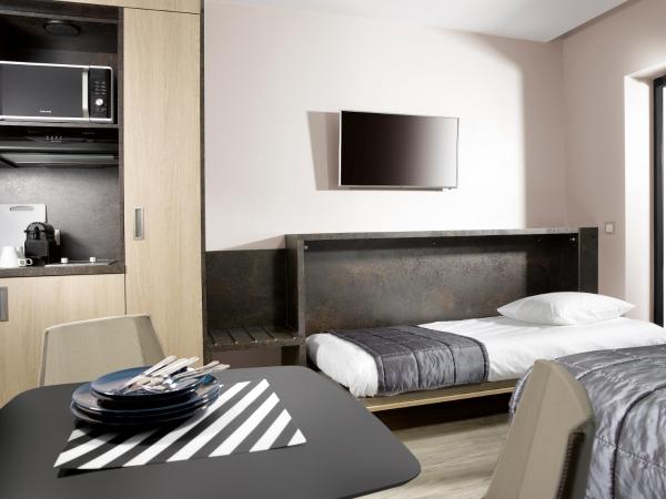 One Loft Appart : photo 3 de la chambre appartement avec terrasse - chambre triple