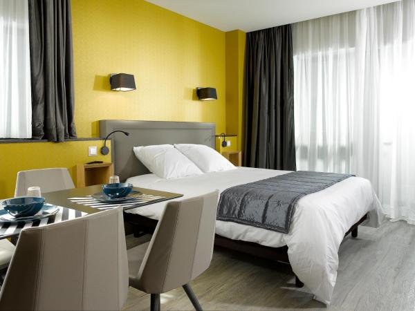 One Loft Appart : photo 1 de la chambre appartement avec terrasse - lit double