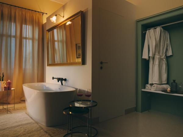 Dimora Archimedea : photo 3 de la chambre suite supérieure lit king-size