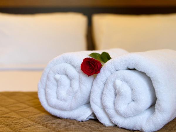 Sanctum Suites Whitefield Bangalore : photo 5 de la chambre chambre lit queen-size deluxe