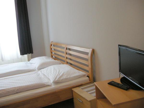 Pension Schottentor : photo 8 de la chambre chambre quadruple