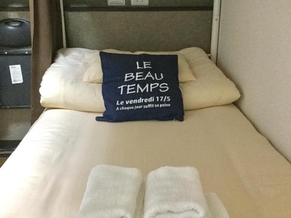 Keimei Guest House : photo 10 de la chambre chambre quadruple avec lits superposés