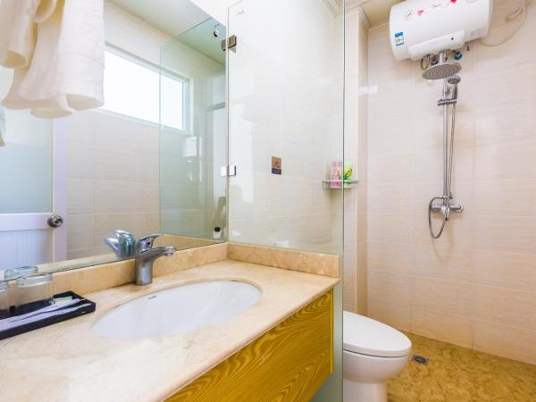 Sanya Passion fruit Inn : photo 1 de la chambre chambre double avec balcon