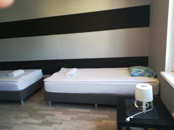 Tetris Sopot : photo 5 de la chambre chambre quadruple avec salle de bains privative séparée