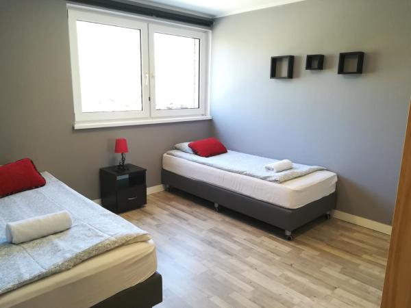 Tetris Sopot : photo 3 de la chambre chambre lits jumeaux avec salle de bains privative