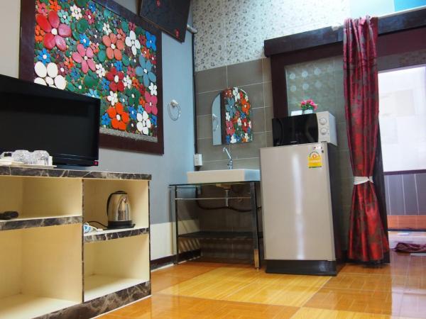 Wiang Kum Kam Resort : photo 3 de la chambre chambre familiale