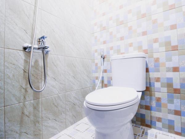 RedDoorz Plus @ Pogung Raya : photo 6 de la chambre chambre double