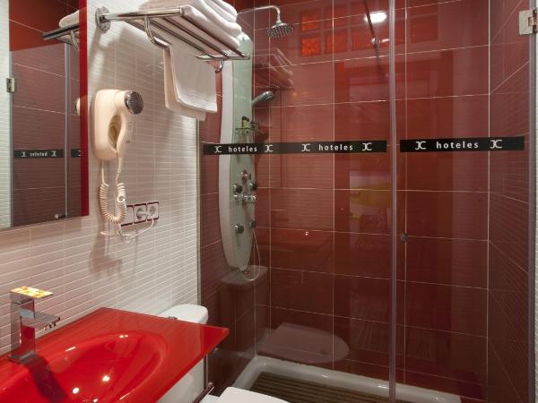 JC Rooms Santa Ana : photo 6 de la chambre chambre triple