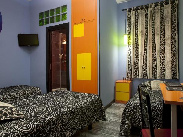 JC Rooms Santa Ana : photo 6 de la chambre chambre quadruple