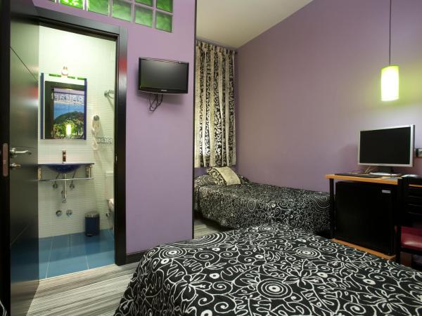 JC Rooms Santa Ana : photo 10 de la chambre chambre quadruple