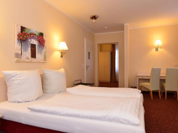Hotel Behrmann : photo 1 de la chambre chambre triple