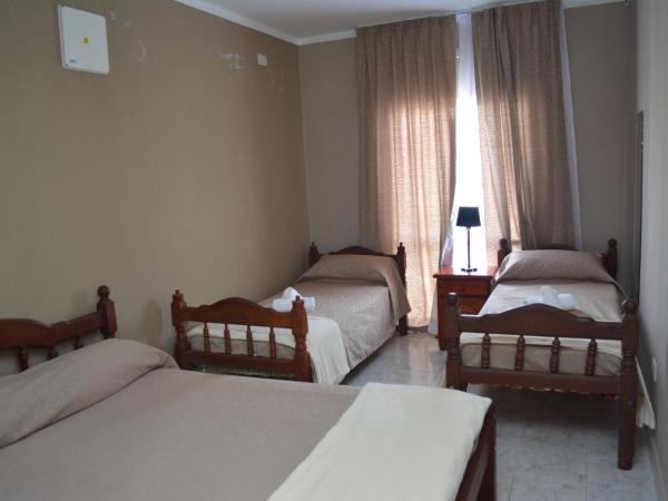 Hotel Isella : photo 2 de la chambre chambre quadruple de luxe