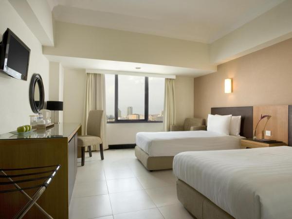 Hotel Santika Pandegiling - Surabaya : photo 3 de la chambre chambre lit king-size deluxe