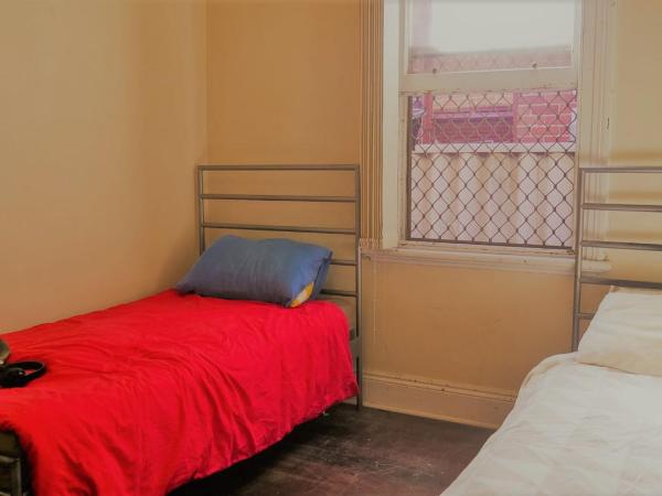 myOZexp Palmerston Lodge : photo 1 de la chambre chambre lits jumeaux