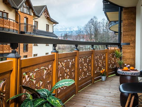 Apartamenty Forma Tatrica : photo 6 de la chambre appartement 1 chambre confort avec cheminée et balcon ou terrasse