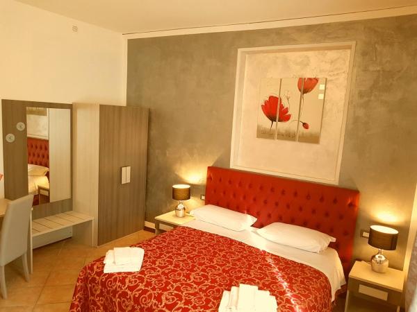 B&B La Cittadella : photo 4 de la chambre chambre familiale avec salle de bains privative