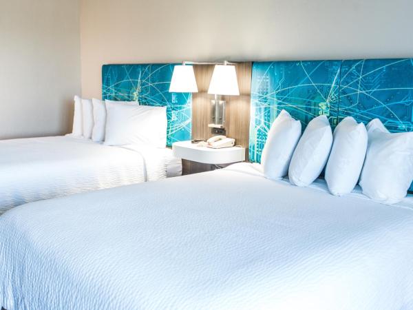 Tropical Seas Hotel : photo 8 de la chambre chambre lit queen-size deluxe