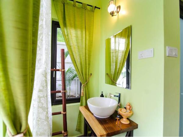 Casugria Dutch Residence 1810 : photo 5 de la chambre chambre familiale - vue sur jardin