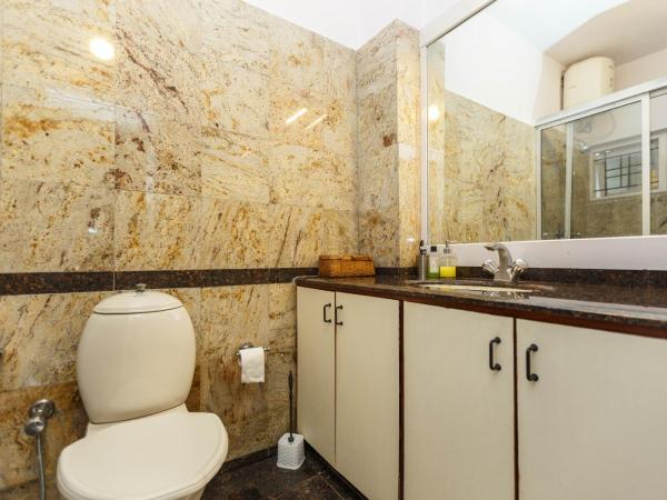 Locul Uptown - Near Bangalore Palace Grounds : photo 1 de la chambre chambre lit queen-size deluxe