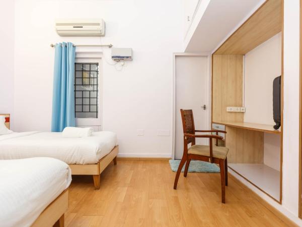 Locul Uptown - Near Bangalore Palace Grounds : photo 4 de la chambre standard doube room with shower