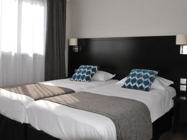 Hôtel Des Quatrans : photo 4 de la chambre chambre lits jumeaux